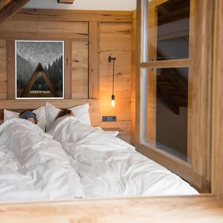 Апартаменты Im Chaletstil Giebeltraum 115 Qm Wellness Fitness Sauna Bergroedelhof *